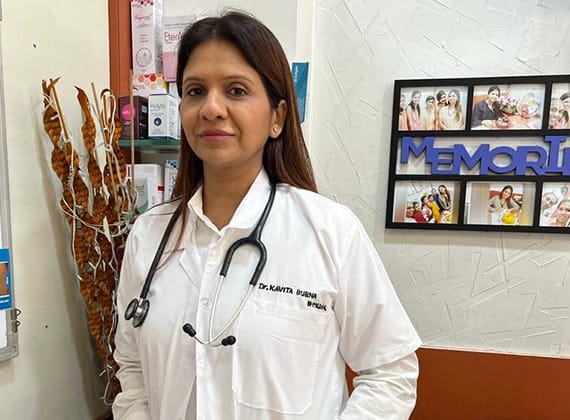Dr. Kavita Bubna standing inside the clinic